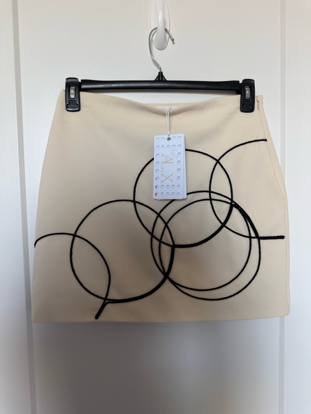 AX Paris Cream Mini Skirt with Black Circle Motif